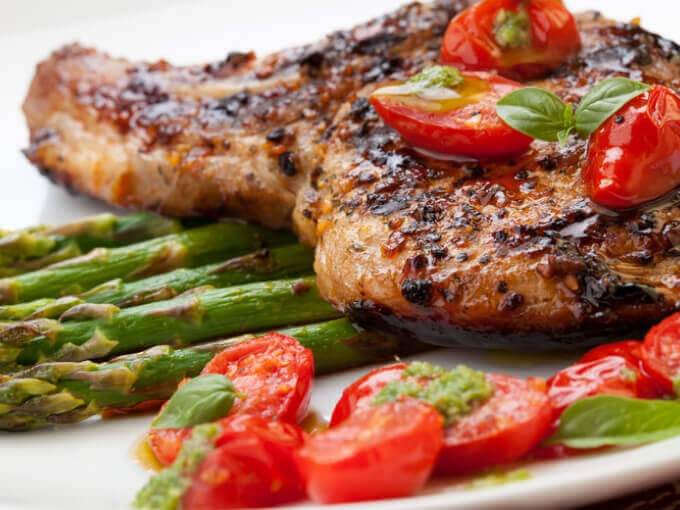 Keto Grilled Pork Chops With Asparagus And Pesto